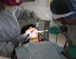 LLU dental students enact roles of operators and patients during the study's clinical trial