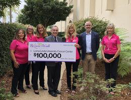 Stater Bros. Charities and Inland Women Fighting Cancer present a $100,000 check to LLU Cancer Center