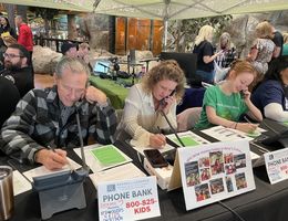 Volunteers at radiothon answering phone calls