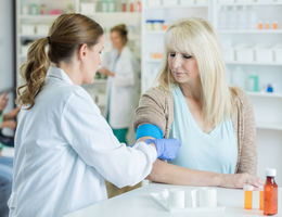 Haven’t received a flu vaccination? It’s not too late. female physician giving flu shot to female patient