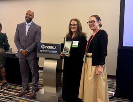 Dean Buckles with award
