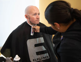 No Shave November 2019 fundraiser breaks donation record man getting beard shaved
