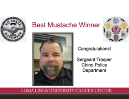 Slide announcing Sergeant Trosper of the Chino Police Department as Best Mustache Winner