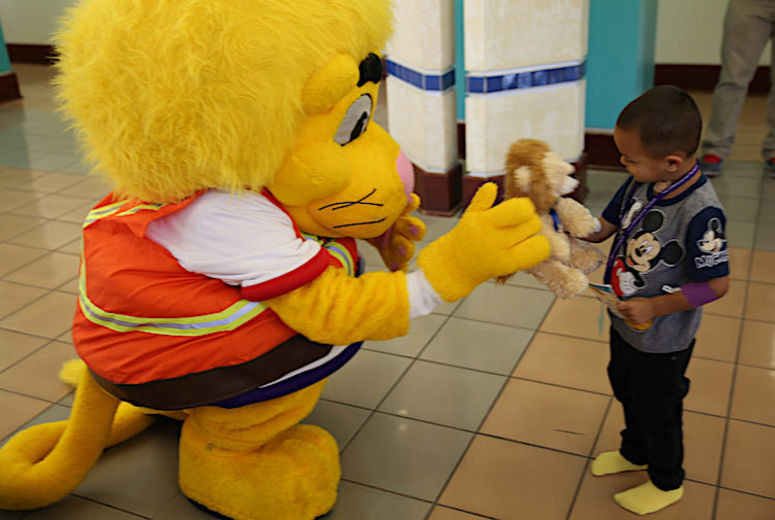 LLUCH patient and Luke the Lion.