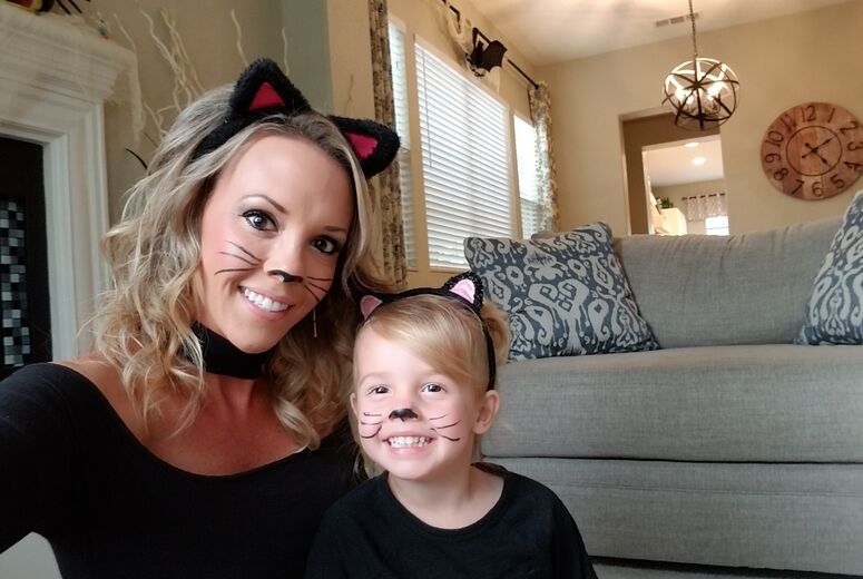 Vivian and Mommy dressed like cats