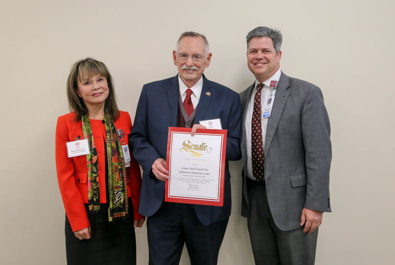 Darrell Connerton, Senator Stone’s 28th Senate District Representative, presented a certificate of excellence to LLUBMC.