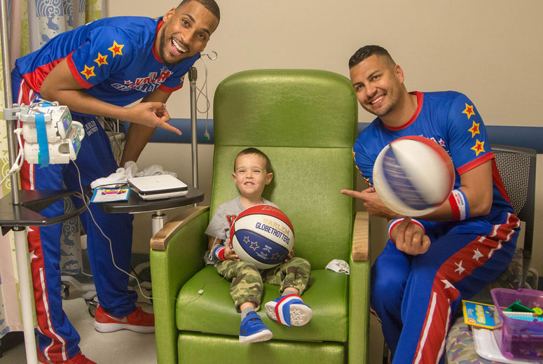 "Zeus" McClurkin, left, and "El Gato" Melendez spent time with children and their families who are receiving care at the hospital. The Harlem Globetrotters brought Valentine's Day cheer to children at the Loma Linda University Children's Hospital Hematology/Oncology Clinic on Wednesday, February 14, 2018, in Loma Linda, California.