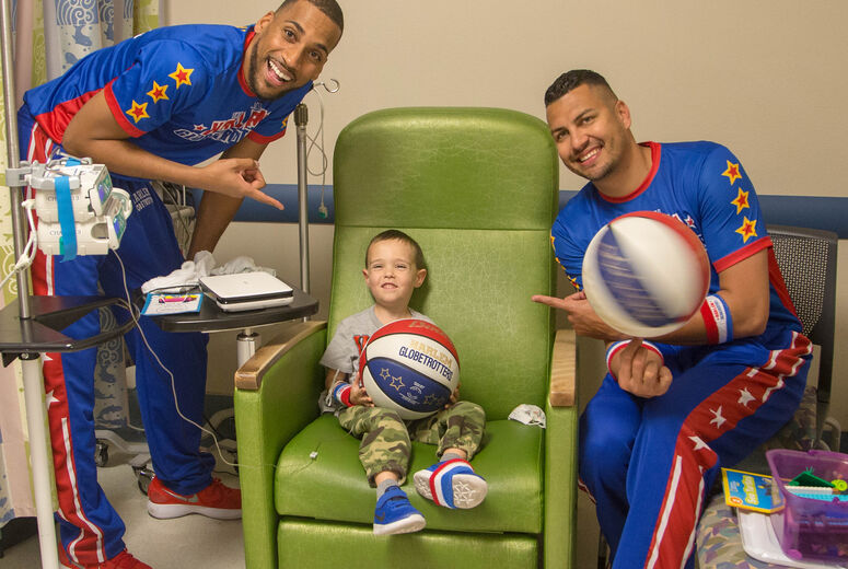 "Zeus" McClurkin, left, and "El Gato" Melendez spent time with children and their families who are receiving care at the hospital. The Harlem Globetrotters brought Valentine's Day cheer to children at the Loma Linda University Children's Hospital Hematology/Oncology Clinic on Wednesday, February 14, 2018, in Loma Linda, California.