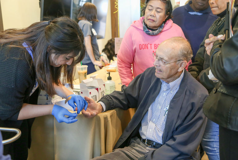 Attendees received free glucose and lipid testing during the San Bernardino community event.