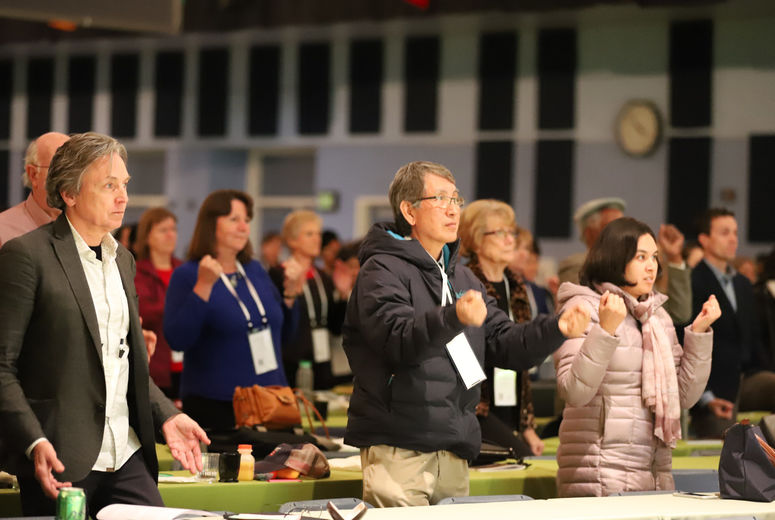 Attendees participated in daily stretches and physical activity during the conference.
