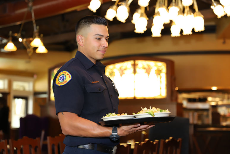 firefighter server at the Old Spaghetti Factory restaurant 