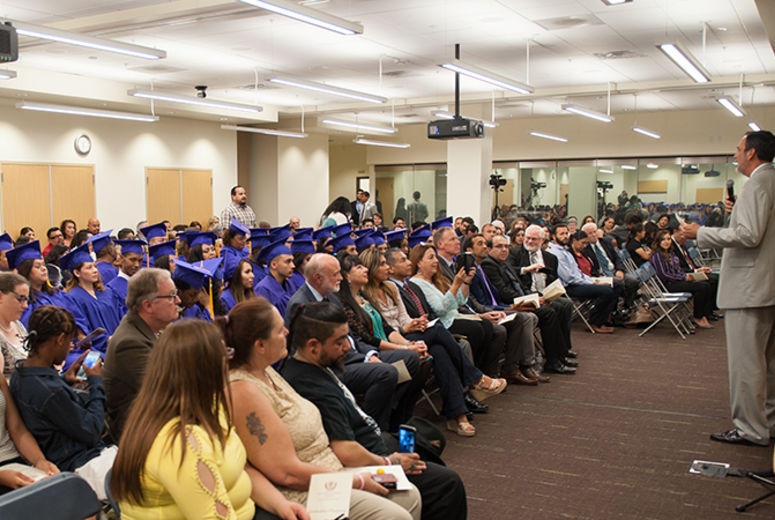 Executive Director Arwyn Wild, MA, addresses the room during the first commencement ceremony for San Manuel Gateway College in San Bernardino.