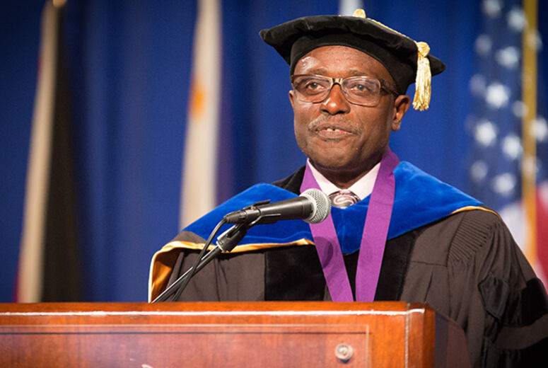  Daniel Sandy, PhD, addresses graduates of the Schools of Religion and Behavioral Health about the importance of empowering partners in mission service.