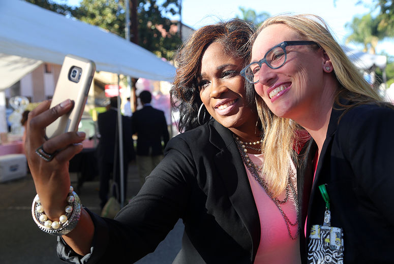 Shay Manns (L) and Andrea Ray, MD, celebrate Breast Cancer Awareness Day with a double selfie.