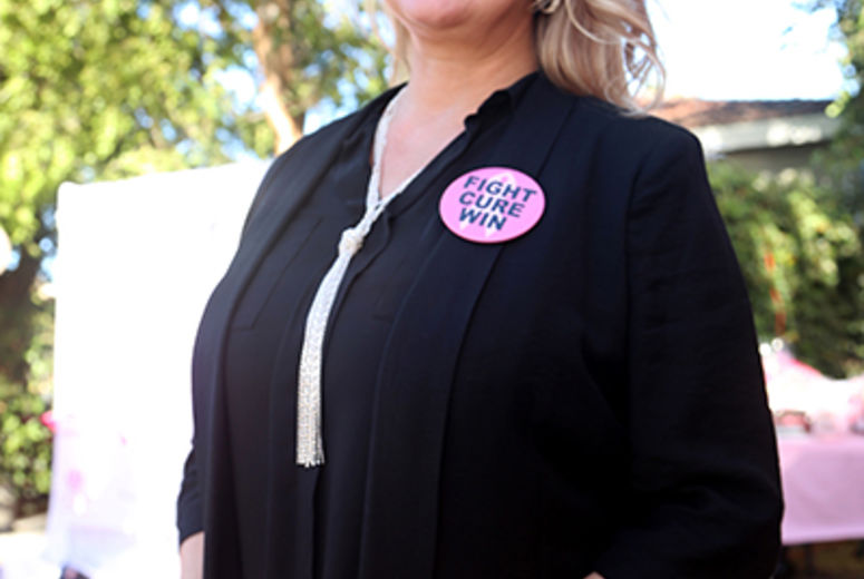 Clinic director Cherl Tidwell sports a great motto for women fighting cancer.