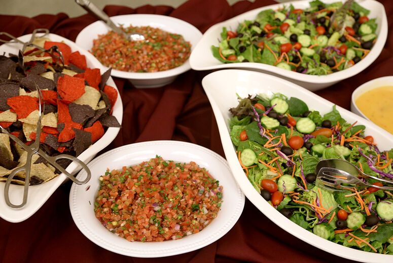 The menu included colorful chips, salsas and salads. 