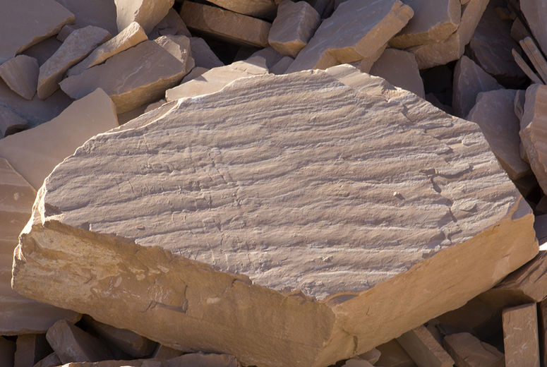 Coconino Sandstone occurs in many colors and assumes many forms in northern Arizona. This ripple pattern showcases the beauty and elegance of the stone. 