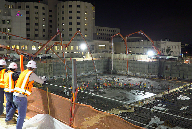 Work on the new hospital building began March 25, as 5,400 cubic yards of concrete were poured into place. (photo by Cosmin Cosma) 