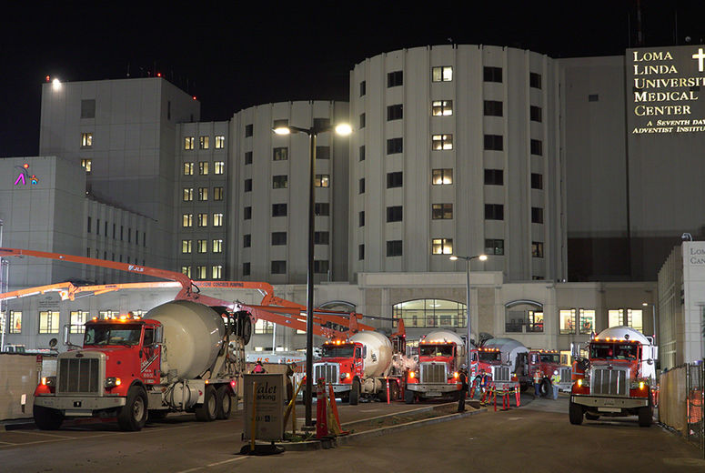 A steady stream of concrete trucks arrived at the construction site. (photo by Cosmin Cosma) 