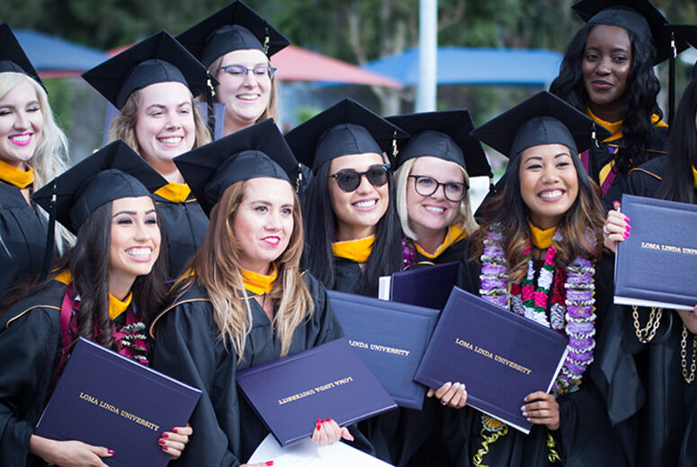 After the religion and behavioral health commencement, these women gather for a group photo.