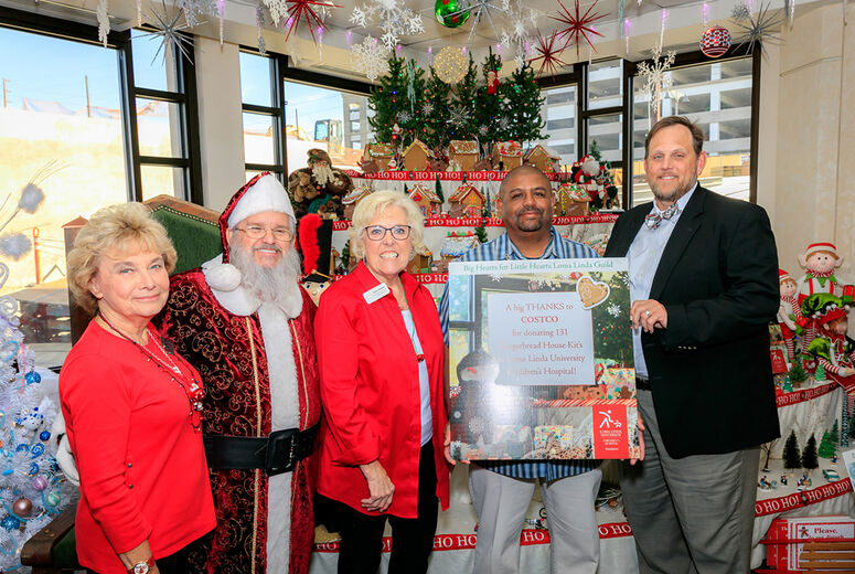 Thanks, Costco, for donating 131 Gingerbread House kits.