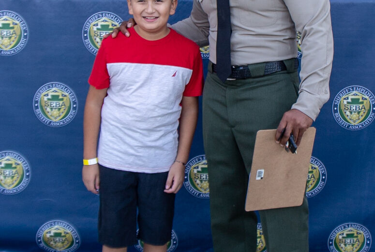 LLU Children's Hospital patients paired with San Bernardino County Sheriff’s Department members to shop for school supplies, healthcare products and clothes.