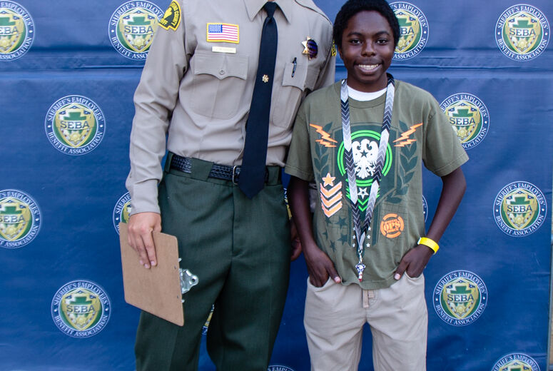 LLU Children's Hospital patients paired with San Bernardino County Sheriff’s Department members to shop for school supplies, healthcare products and clothes.