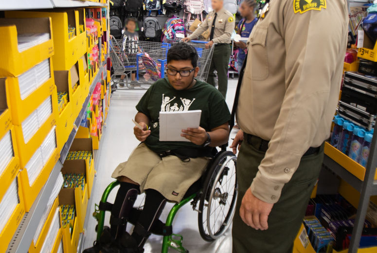LLU Children's Hospital patients paired with San Bernardino County Sheriff’s Department members to shop for school supplies, healthcare products and clothes.