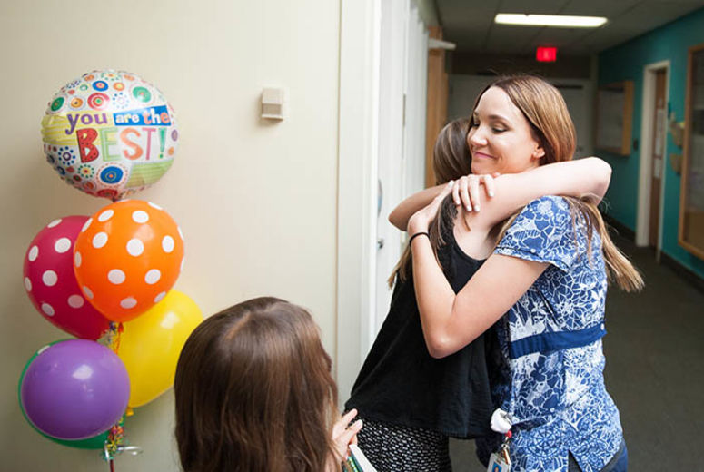 Tramel gave Janelle Cicero, RN a warm hug as she arrived at the Children’s Hospital.