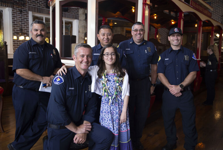 posing for a photo at the Old Spaghetti Factory restaurant 